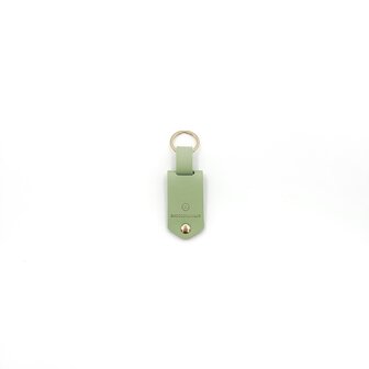 Groene sleutelhanger met initialen en fotohoudertje