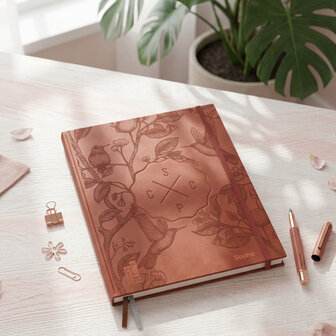 Terracotta academische planner agenda 2026-2027 weekplanner docenten leerkrachten  met pen in terracotta kleur balpen dure pen