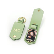 Groene sleutelhanger met initialen en fotohoudertje